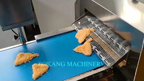 Batter and breading machine in operation